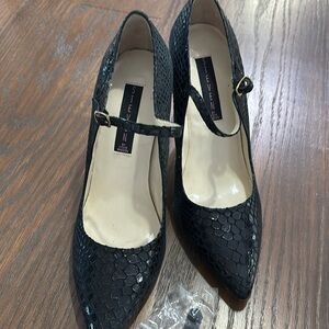 Mary Jane’s, Snake print, 3” heel. Worn a couple of times. Extra heel taps.